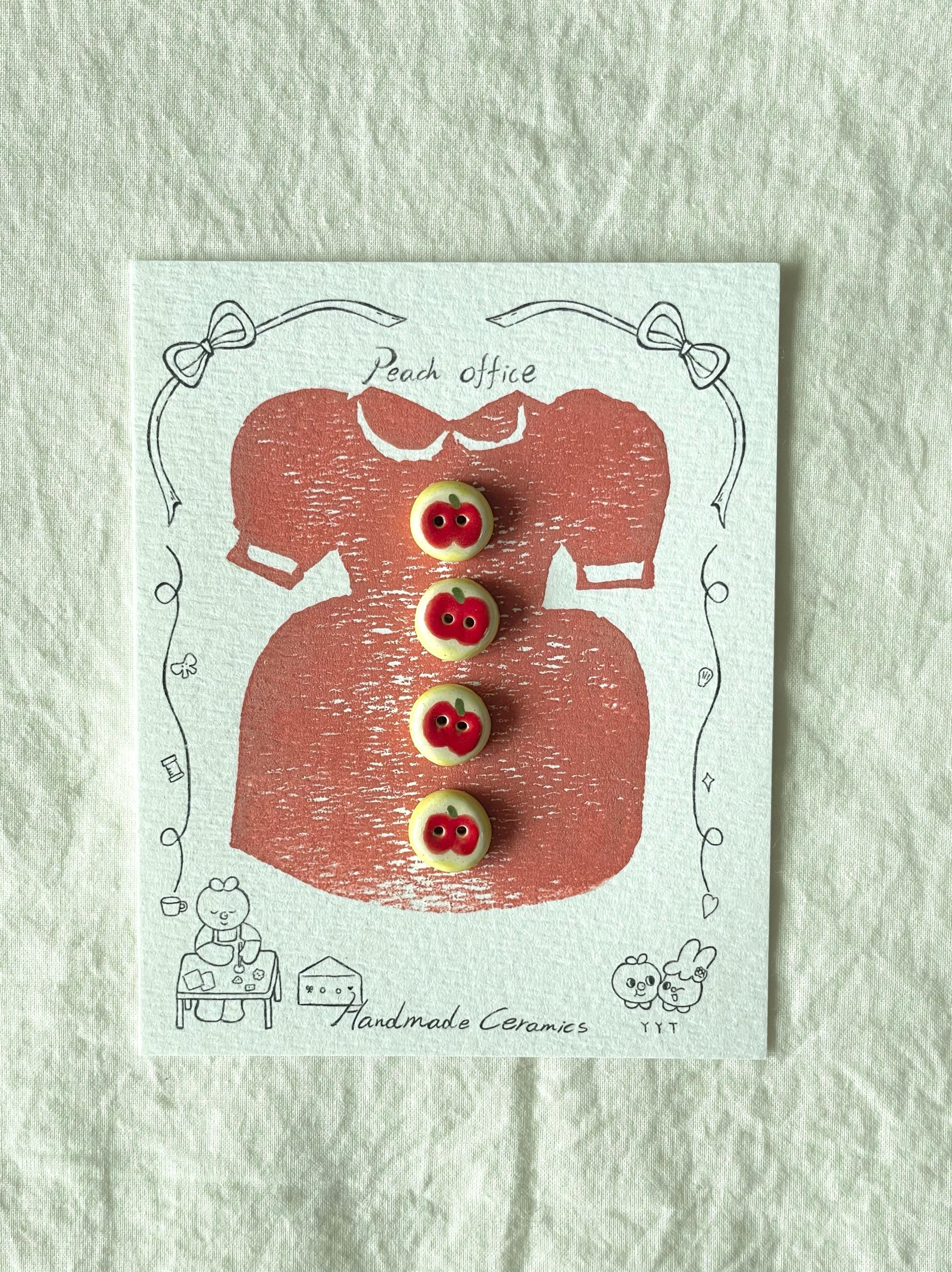 red apple buttons