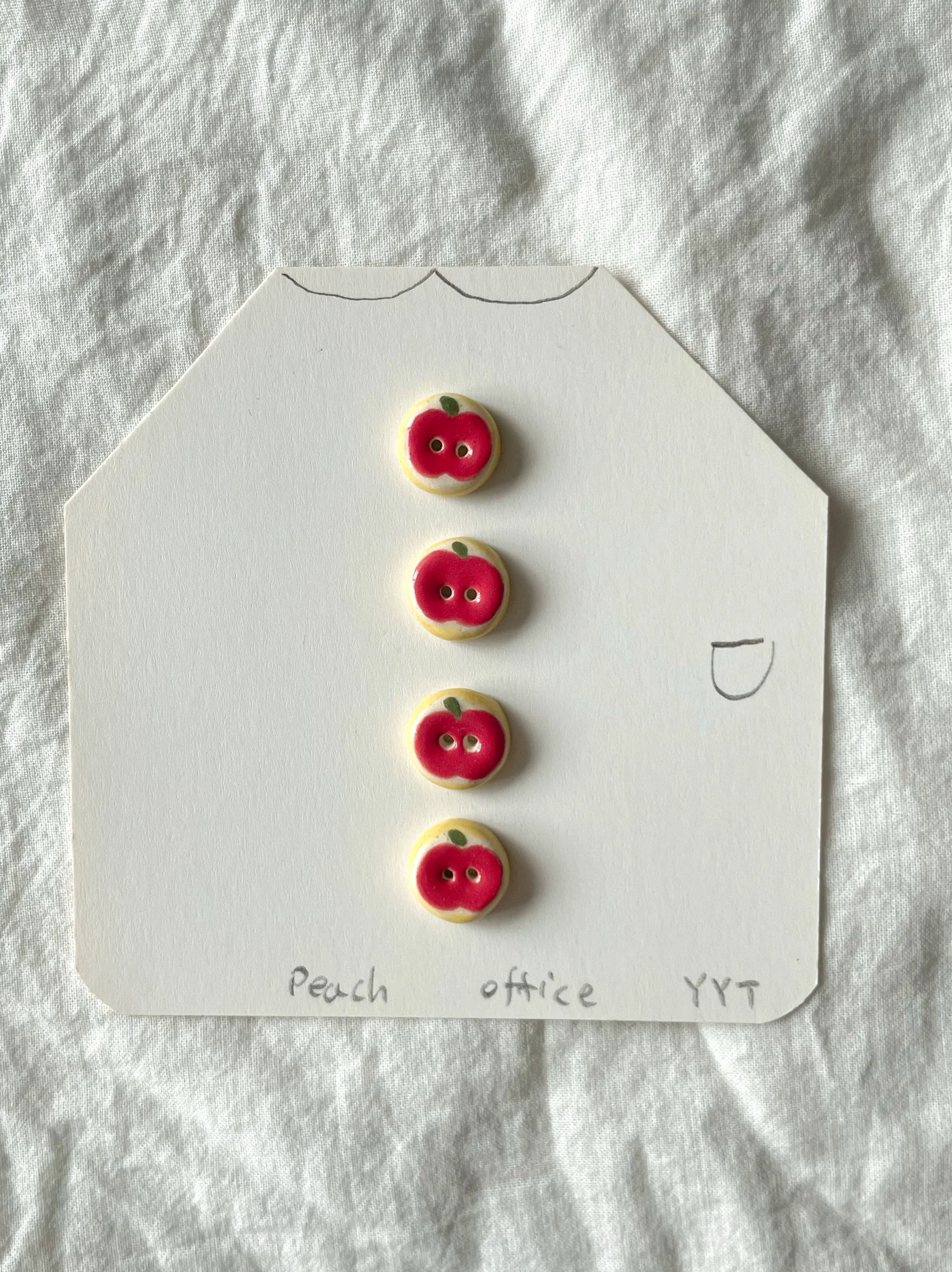 red apple buttons
