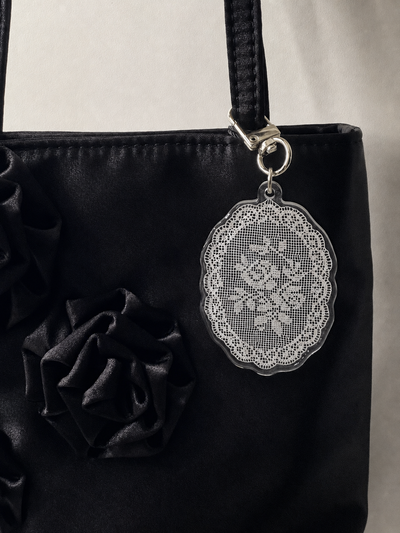 Sunday lace charm