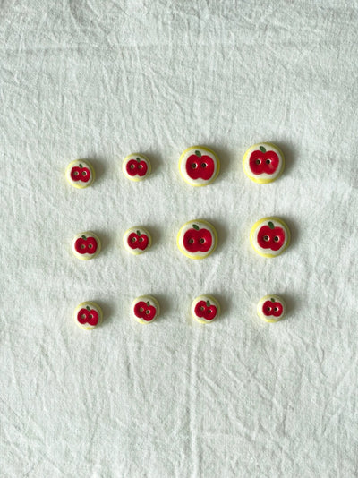 red apple buttons