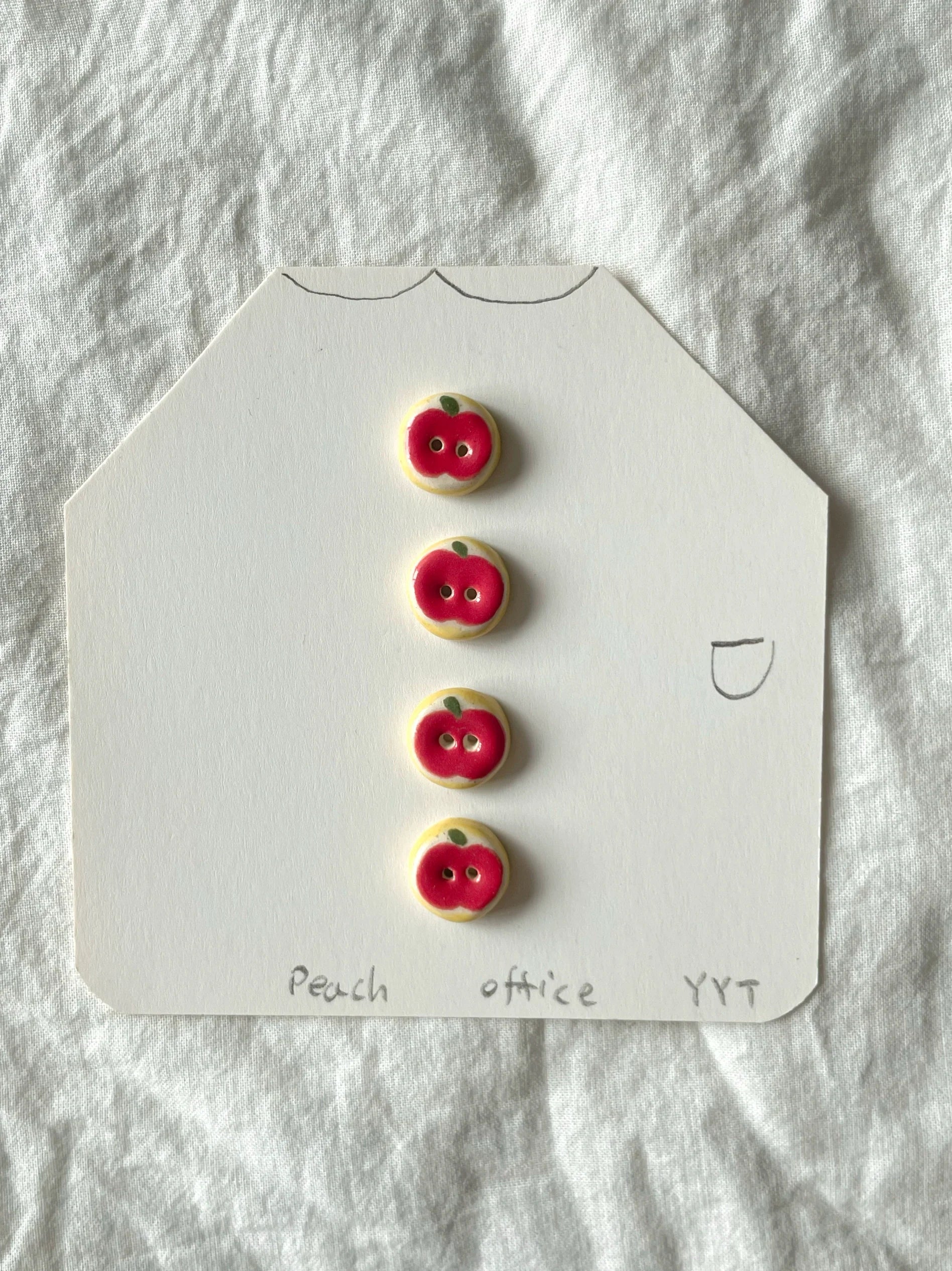 red apple buttons